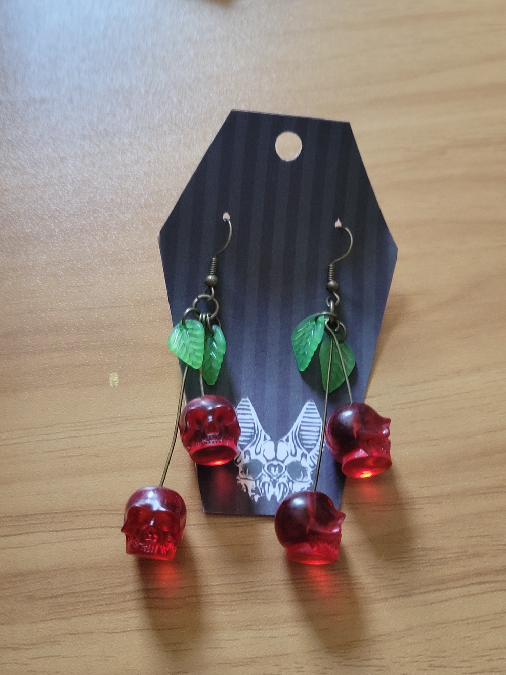 💀NEW💀Hand Crafted Red Skull Drop Earrings with Green Leaf Accents
